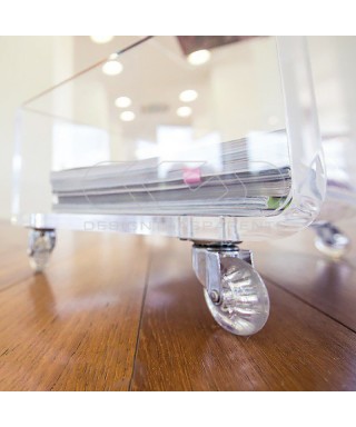 50x50 Acrylic clear rolling TV stand with holder objects.