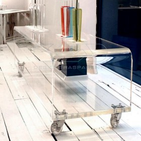 80x30 Acrylic clear rolling TV stand with holder objects.