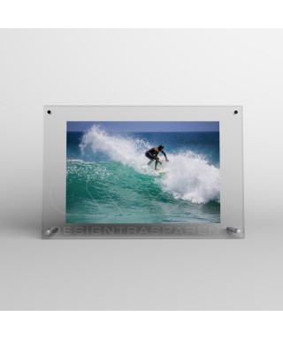 Acrylic 10cm tabletop photo frame with metal supports.
