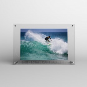 Acrylic 10cm tabletop photo frame with metal supports.