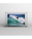 Acrylic 10cm tabletop photo frame with metal supports.