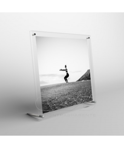 Acrylic 10cm tabletop photo frame with metal supports.