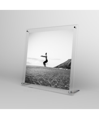 Acrylic 10cm tabletop photo frame with metal supports.