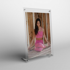 Acrylic 10cm tabletop photo frame with metal supports.