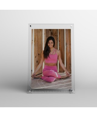 Acrylic 15cm tabletop photo frame with metal supports.