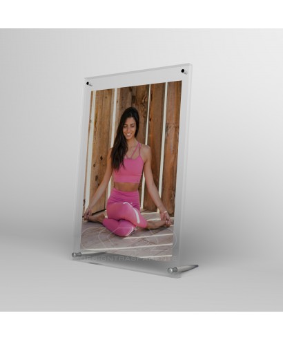 Acrylic 20cm tabletop photo frame with metal supports.