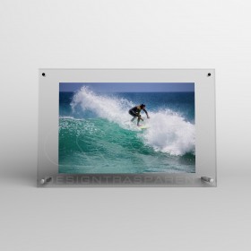 Acrylic 25cm tabletop photo frame with metal supports.