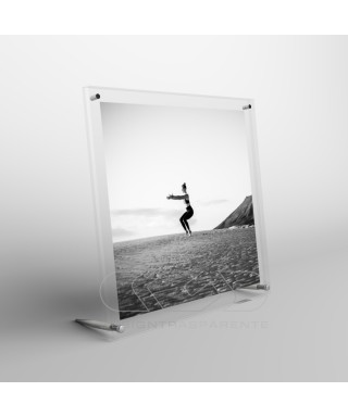 Acrylic 25cm tabletop photo frame with metal supports.