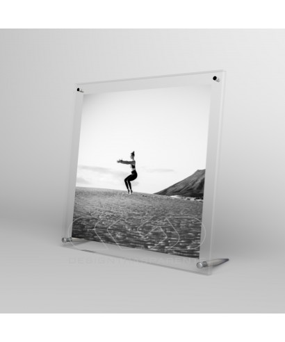 Acrylic 25cm tabletop photo frame with metal supports.