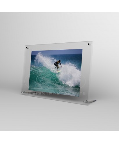 Acrylic 30cm tabletop photo frame with metal supports.