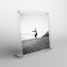 Acrylic 30cm tabletop photo frame with metal supports.
