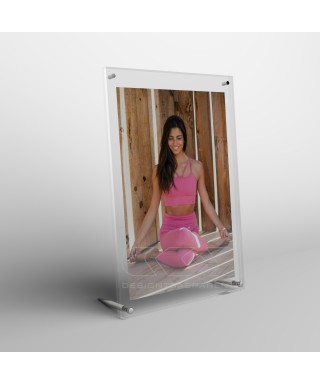 Acrylic 30cm tabletop photo frame with metal supports.
