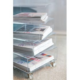 Bedside table magazine rack serving trolley in transparent acrylic.