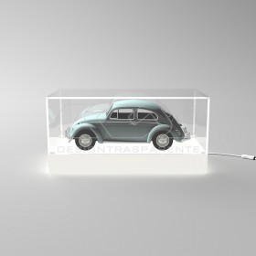 Teca LED cm 70 con base bianca illuminata realizzata in plexiglass.