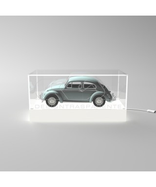Teca LED cm 65 con base bianca illuminata realizzata in plexiglass.
