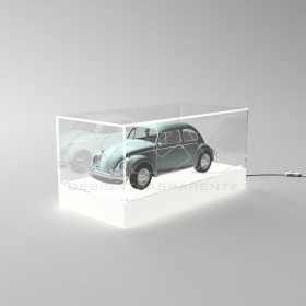 Teca LED cm 65 con base bianca illuminata realizzata in plexiglass.