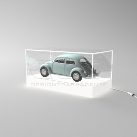 Teca LED cm 65 con base bianca illuminata realizzata in plexiglass.