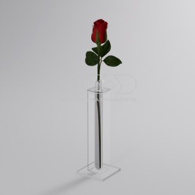 Minimalist and elegant transparent acrylic single-flower vase.