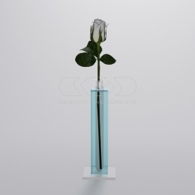 Minimalist and elegant transparent light blue acrylic single-flower vase.