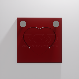 Gancio appendiabiti da muro Cuore in plexiglass rosso trasparente.